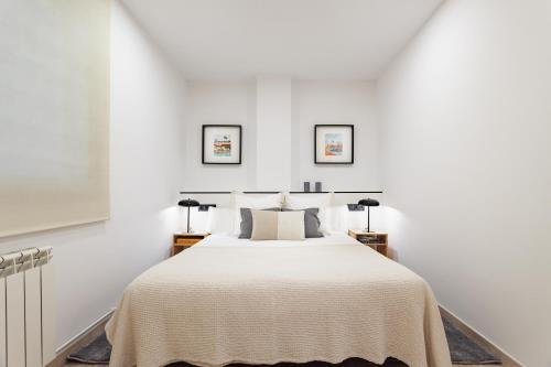 เตียงในห้องที่ Cozy Apartment II - Les Corts