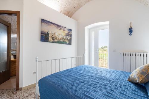 Postel nebo postele na pokoji v ubytování Corallo House