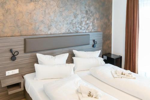 Postel nebo postele na pokoji v ubytování Central Hotel & Lounge Adult Only