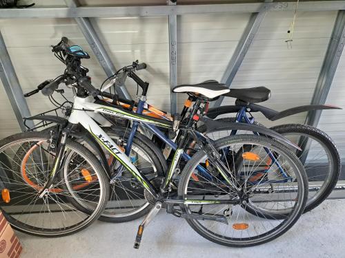two bikes parked next to each other in a garage at Morning Coffee in Ljubljana