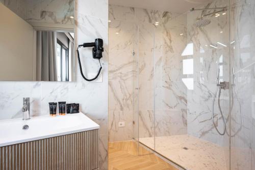 Koupelna v ubytování Hotel Playa Suite