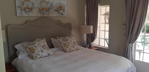Katil atau katil-katil dalam bilik di Green Willows Guest House