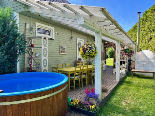 Private family Villa with sauna, hot tub, playground and outside lounge area