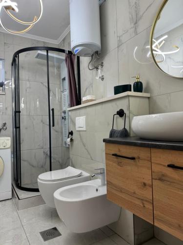 Ένα μπάνιο στο Apartments Brač