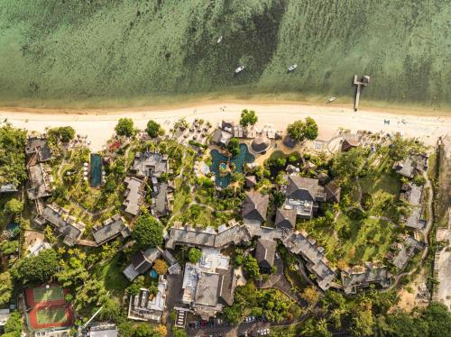 an aerial view of a house on the beach at Hilton Mauritius Resort & Spa in Flic-en-Flac