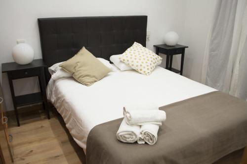 Postel nebo postele na pokoji v ubytování Apartamenticos Boggiero IV