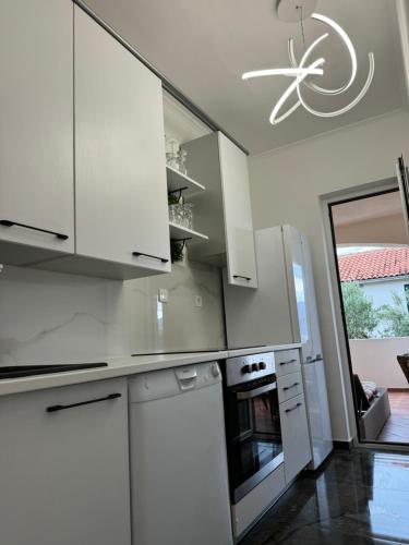 Cuina o zona de cuina de Apartments Brač