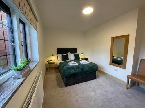 Postel nebo postele na pokoji v ubytování Modern city 3 bedroom bungalow