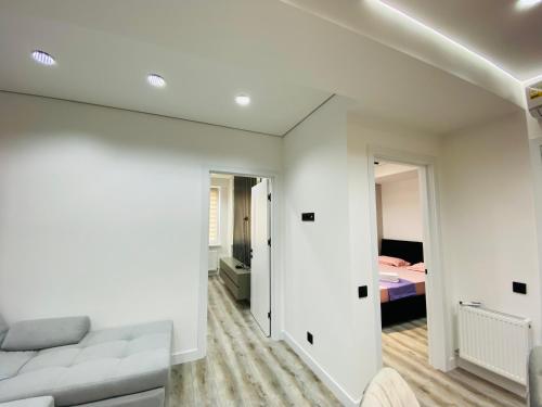 Ένα ή περισσότερα κρεβάτια σε δωμάτιο στο Apartament Relax Chișinău