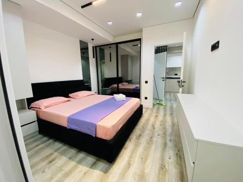 Ένα ή περισσότερα κρεβάτια σε δωμάτιο στο Apartament Relax Chișinău