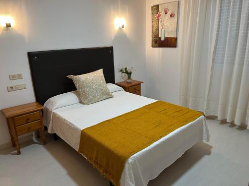 Postel nebo postele na pokoji v ubytování Hotel Ronsel