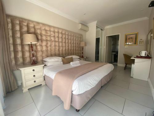 Summerview Boutique Hotel & Conferenceにあるベッド