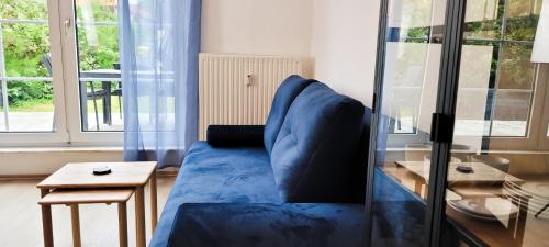 Гостиная зона в KOMM - Terrasse- Parkplatz- Küche- Boxspringbett