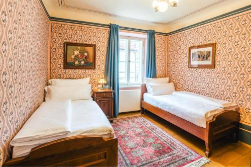 Postel nebo postele na pokoji v ubytování Hotel Latrán