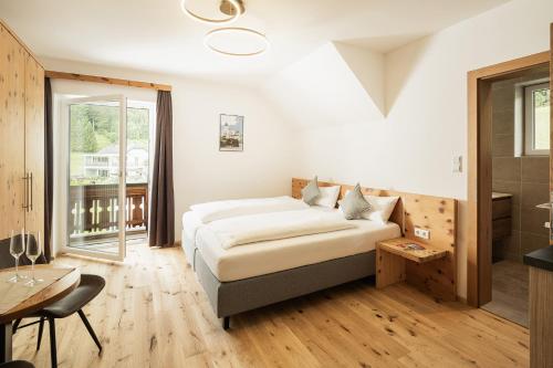 Postel nebo postele na pokoji v ubytování Rest Apartments & Suiten