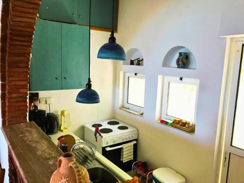 Η κουζίνα ή μικρή κουζίνα στο Villa Aphrodite