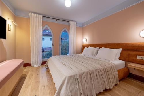 Voodi või voodid majutusasutuse Yonca Anjelika Otel toas