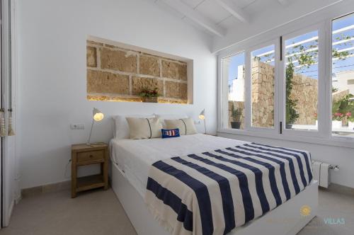 Ένα ή περισσότερα κρεβάτια σε δωμάτιο στο Villa Veles Dos