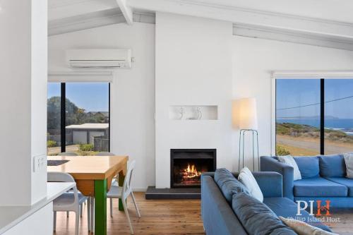 Un lugar para sentarse en Ultimate Beachfront Retreat