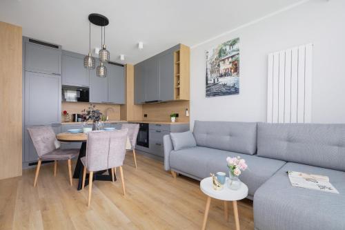 Elegancki Apartament w Krakowie z Klimatyzacją i Dostępem do Siłowni by Noclegi Renters