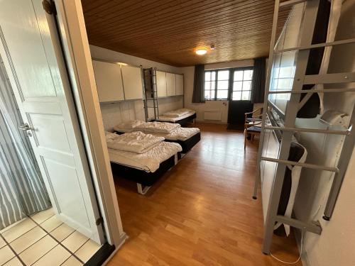 Postel nebo postele na pokoji v ubytování Danhostel Sandvig