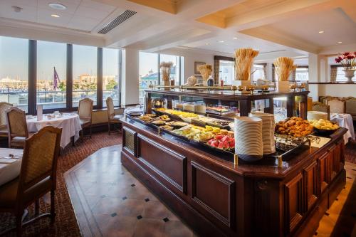 a buffet at a hotel with food on a table at Pomme d'Or Hotel in Saint Helier Jersey