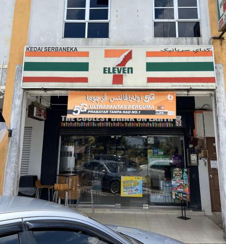 a store with a car parked in front of it at 7 STAY#2 - 1 Room for 3 Pax at Kuala Berang -Best Travelers Stay in Kuala Berang
