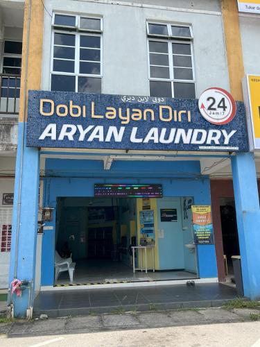 a building with a sign for a gym laundry at 7 STAY#2 - 1 Room for 3 Pax at Kuala Berang -Best Travelers Stay in Kuala Berang
