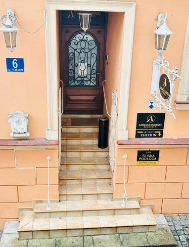 a front door of a house with stairs at Ambasadorski Residence in Rzeszów