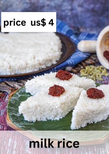 a plate of rice and a milk rice at Ralph recedency in Kochchikade