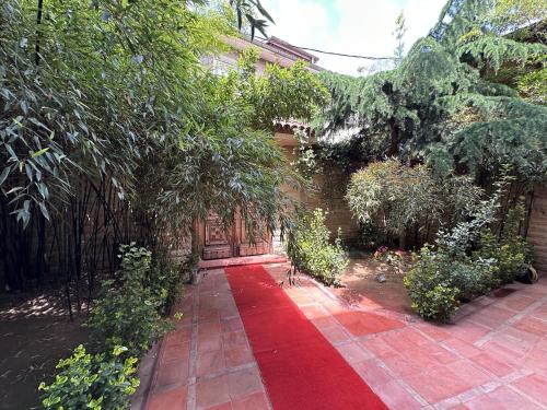 a red carpet in the courtyard of a house at TAHTAKALE KONAK HOTEL Private & Luxury in Bursa