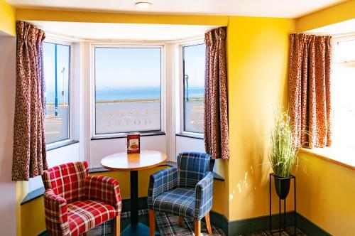Posezení v ubytování Claxton Hotel