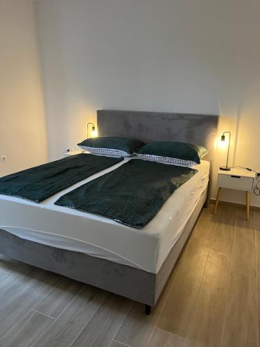 Postel nebo postele na pokoji v ubytování Jelsa Park