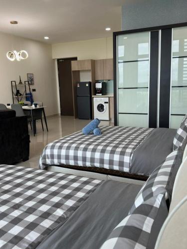 Postel nebo postele na pokoji v ubytování Leisure Home-1Bedroom