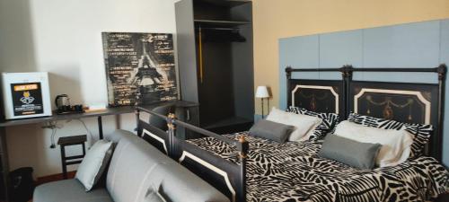 Katil atau katil-katil dalam bilik di Guest House Birrificio Abruzzese