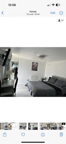 a bedroom with a bed and a desk at Outhouse fully equipped studio in London
