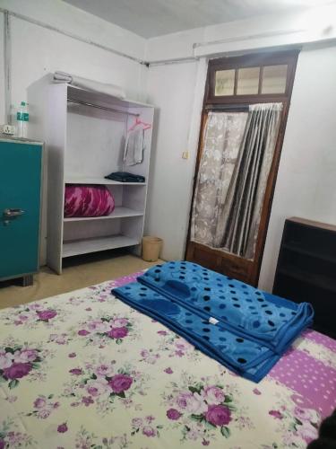 Postel nebo postele na pokoji v ubytování Yuven House