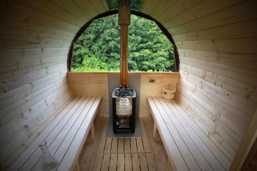 an inside view of a sauna with a window at Garić Bajka in Križevci