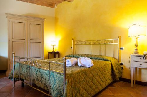 A bed or beds in a room at Villa Borri