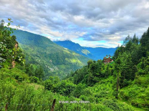 a view of a valley with trees and mountains at Laida Holiday Homestay in Banjār