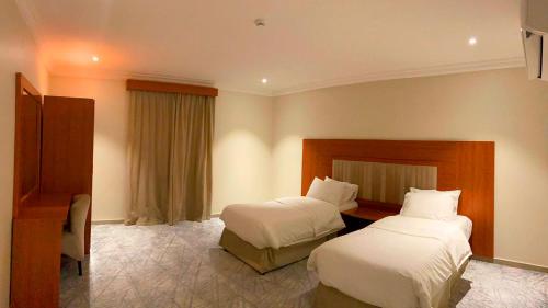 Кровать или кровати в номере Amaken Aparthotel