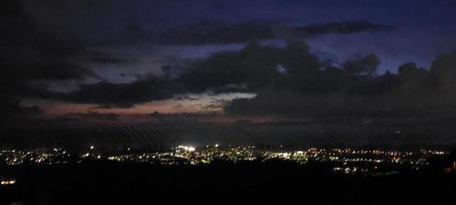 a view of a city at night with at Bellavista Versilia in Pietrasanta