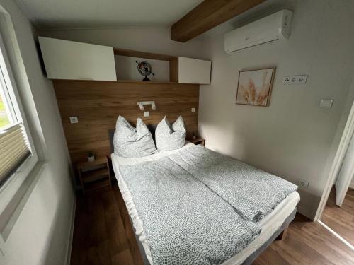 Ένα ή περισσότερα κρεβάτια σε δωμάτιο στο Tinyhouse Neila