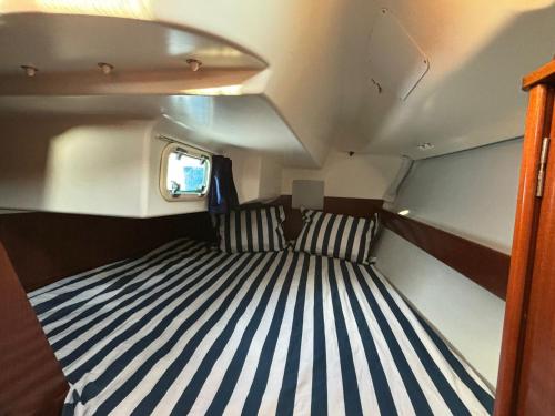 a view of a bed in the back of a boat at Barco à Vela em Peniche - West Sailing in Peniche