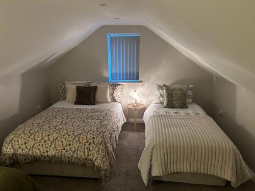 Katil atau katil-katil dalam bilik di The Mourne Hideaway