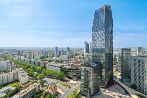 Photo de la galerie de l'établissement L'Appart-Noramic Pouey - Welkeys, à Puteaux