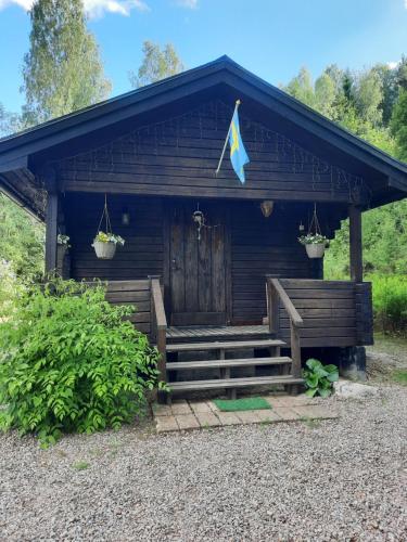 Zahrada ubytování Gemütliche Blockhütte für Auszeit in Torsby auf einem Bauernhof