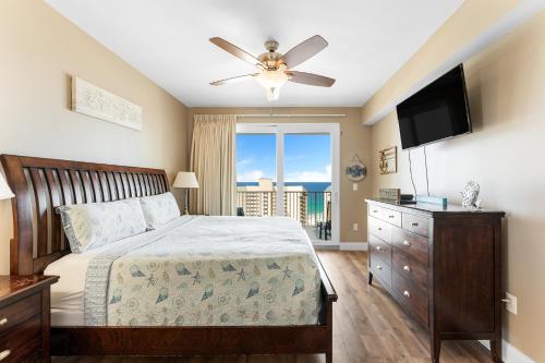 A bed or beds in a room at Laketown Wharf #1211 by Nautical Properties Vacation Rentals
