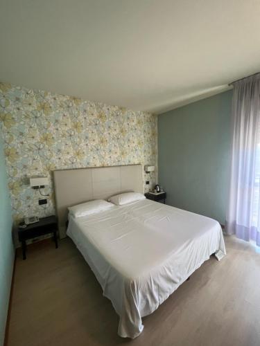 Hotel Parigi 2 & Spaにあるベッド