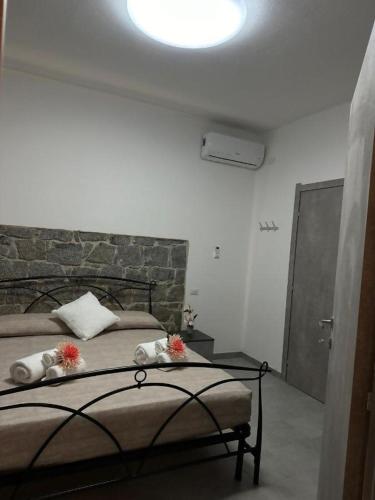 Postel nebo postele na pokoji v ubytování Parole di Sardegna